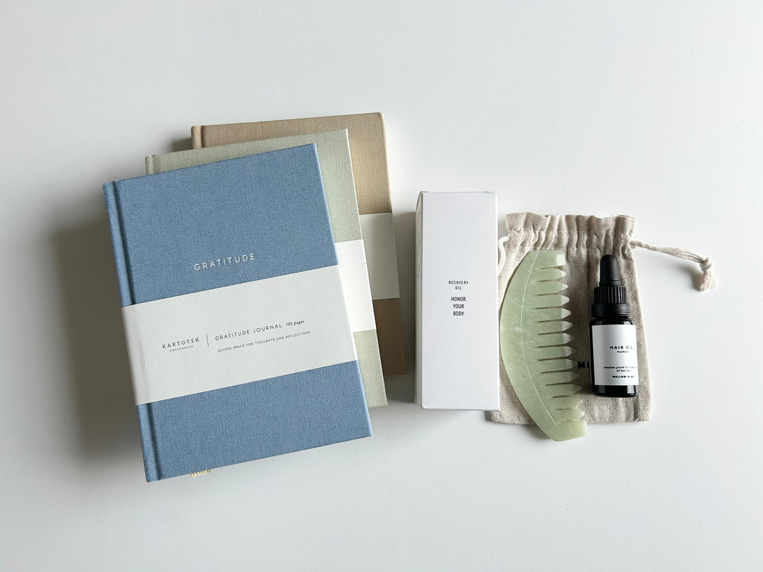 Gifts for well-being: guided journals, gua cha comb, natural body oils