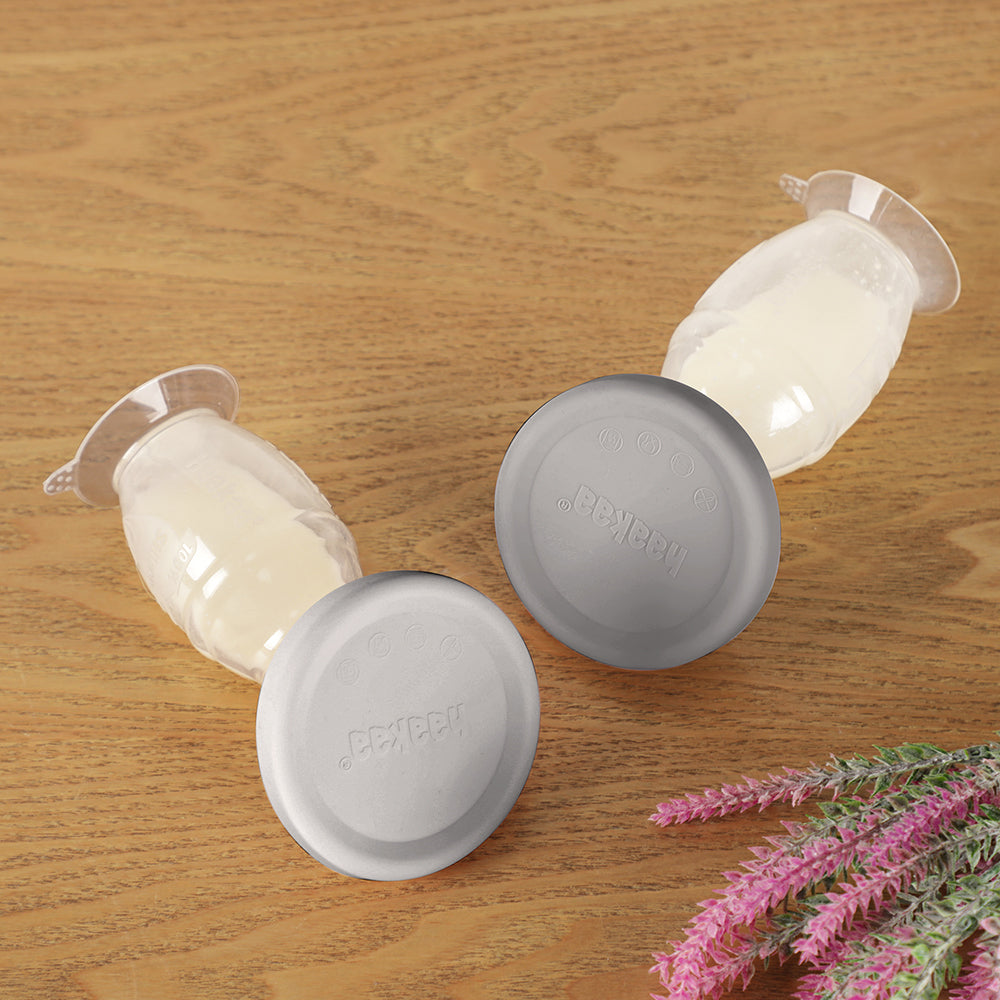 Generation 2 silicone breast pump with suction base and silicone cap