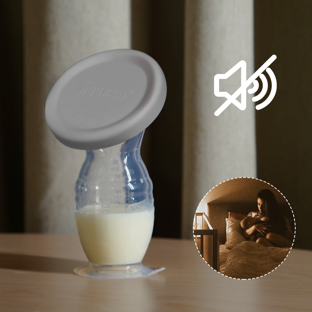 Generation 2 silicone breast pump with suction base and silicone cap
