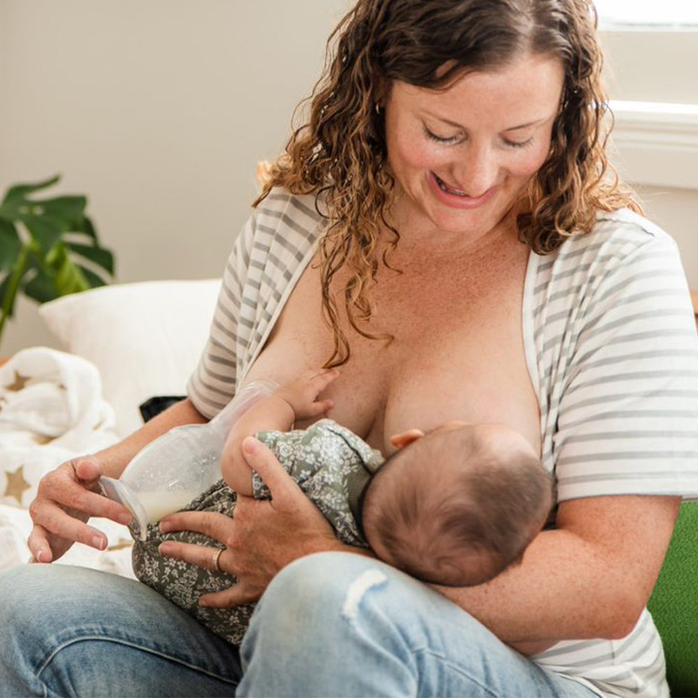 Generation 2 silicone breast pump with suction base and silicone cap