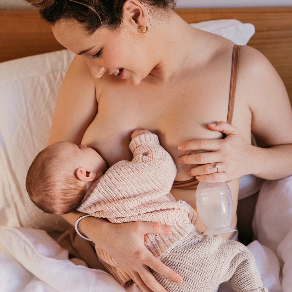 Generation 2 silicone breast pump with suction base and silicone cap