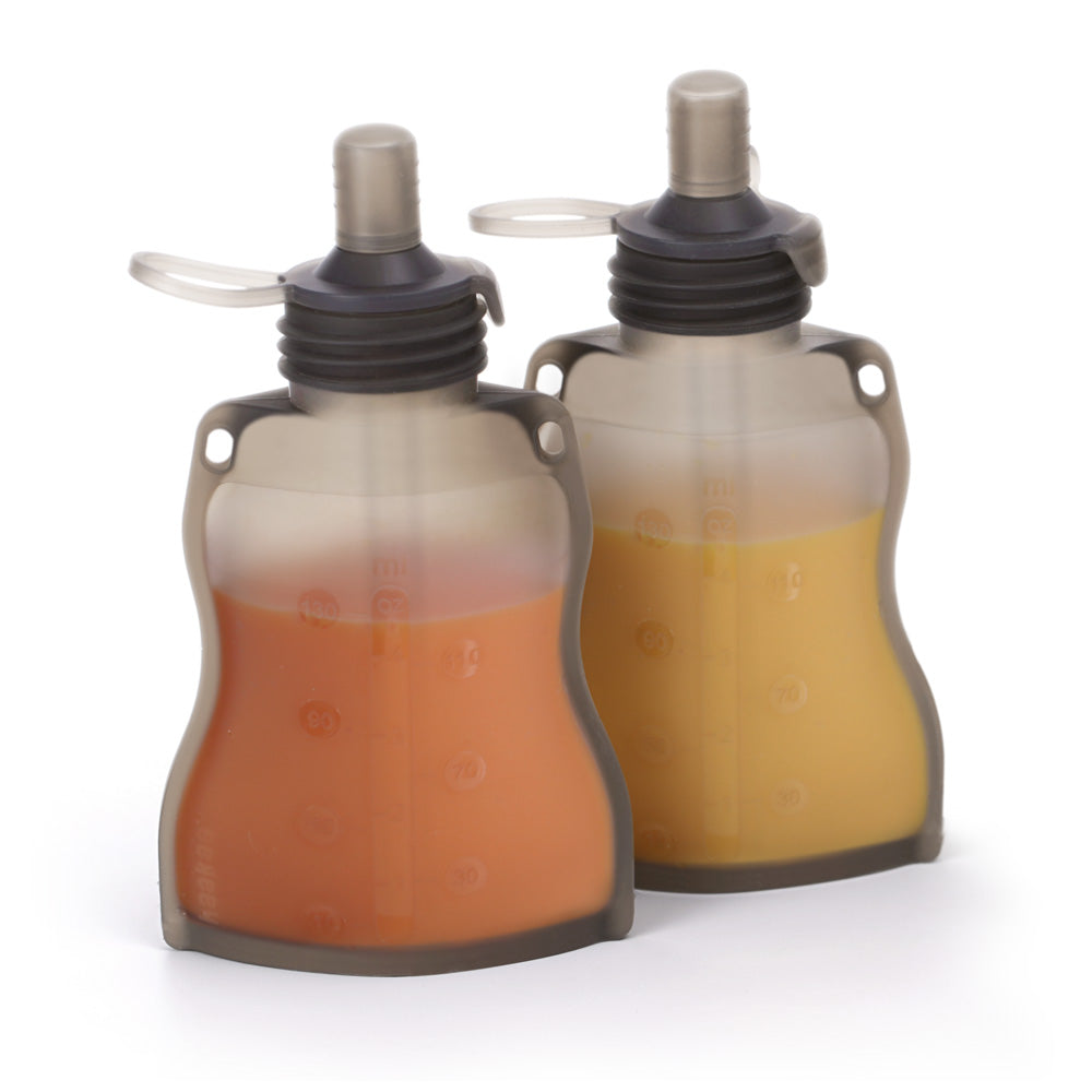 Two reusable baby food pouches filled with colorful purees ready for on-the-go snacking